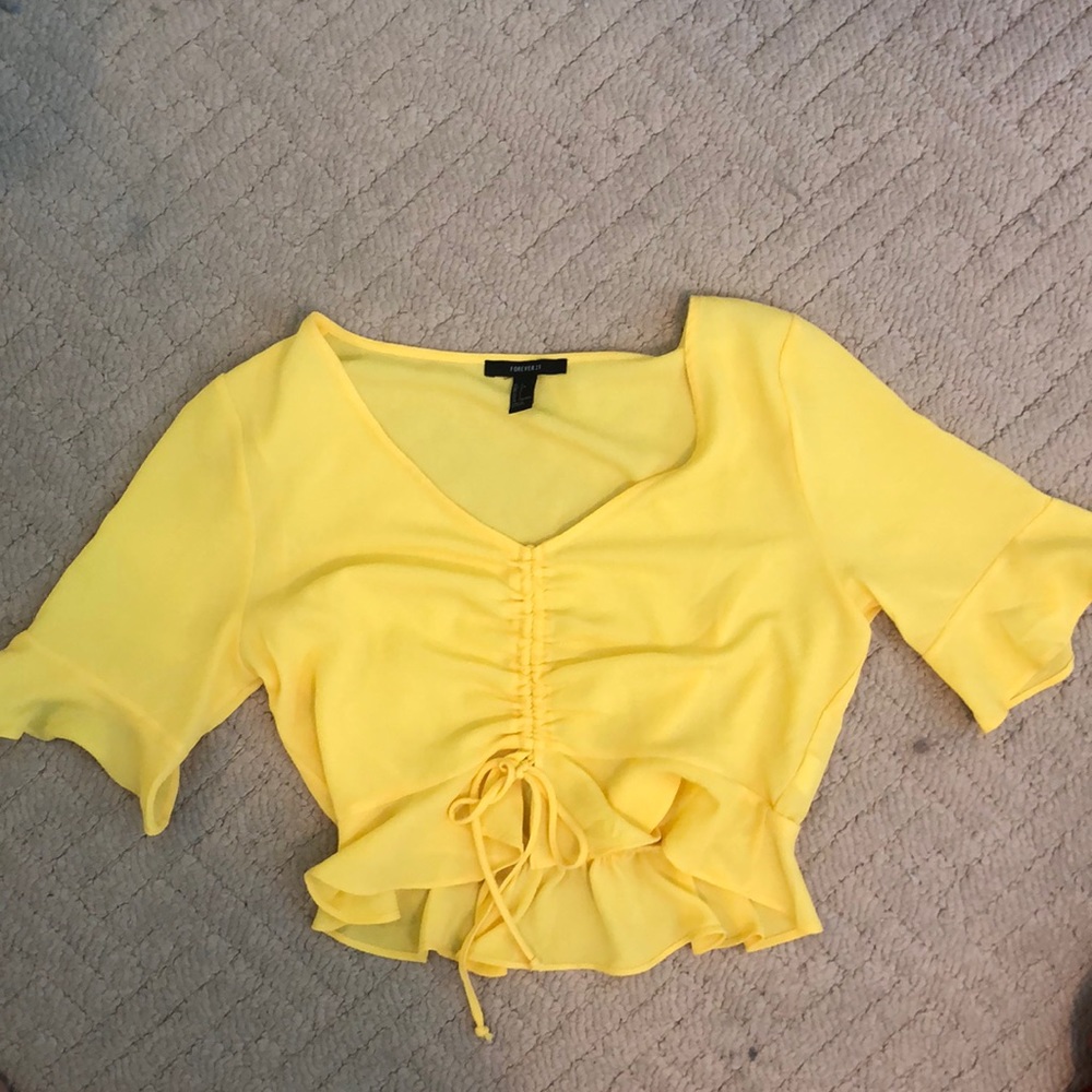 Yellow cropped blouse